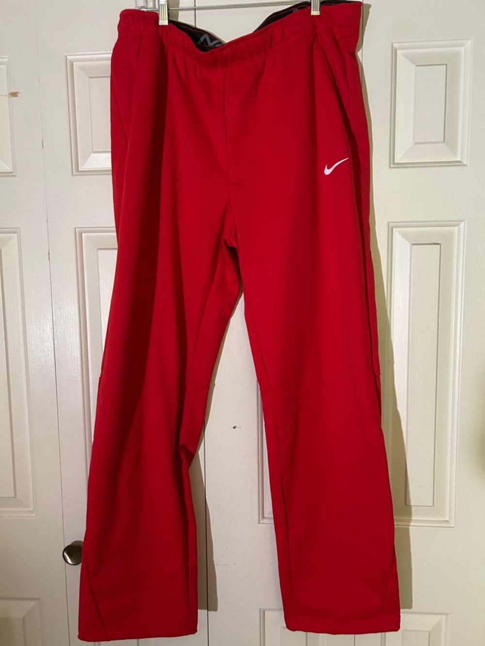 Nike Red Athletic Track Pants with White Swoosh